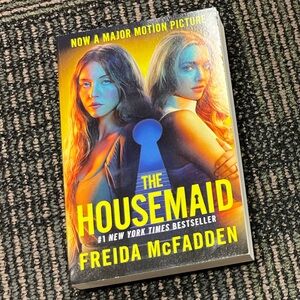 The Housemaid by - Paperback Book in Yellow/Blue Cover